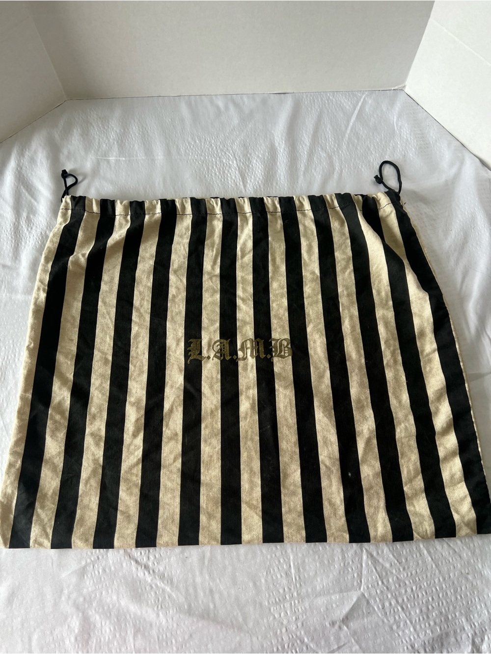 L.A.M.B. Black and Cream Striped Dust Bag